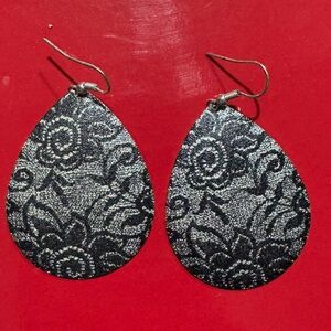 Women’s pierced earrings.